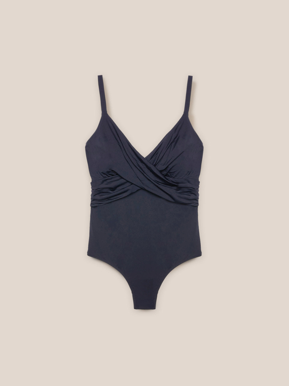 One-piece swimsuit with criss-cross on the front
