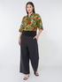 Cropped trousers with trim at the waist image number 0