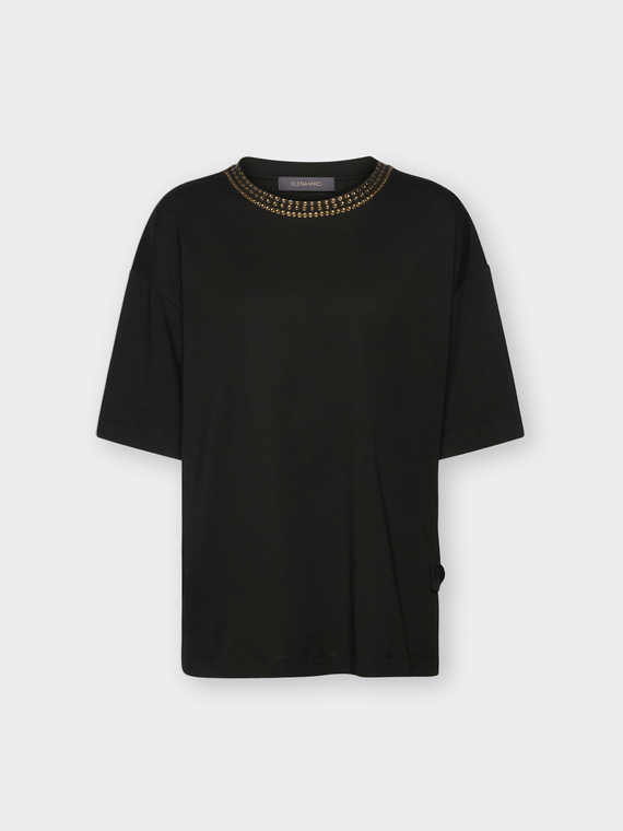 T-shirt in cotone con borchie e lacci laterali