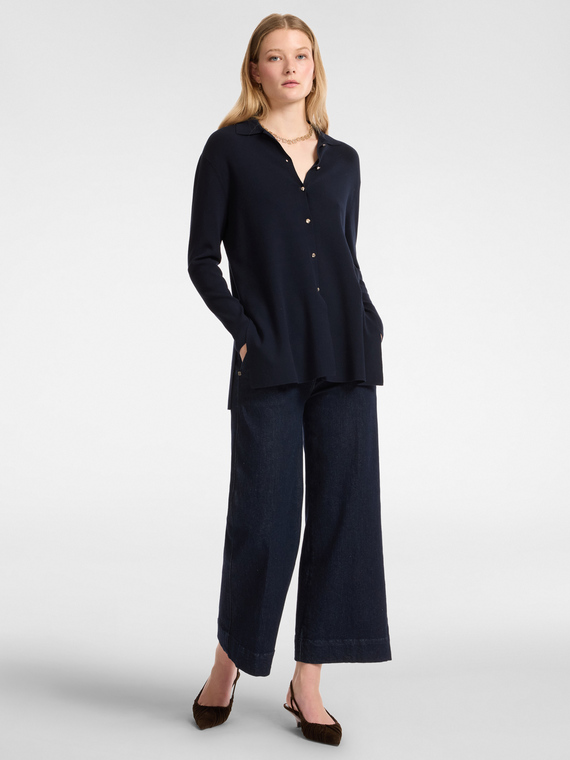 Cal&ccedil;a jeans cortada sob medida