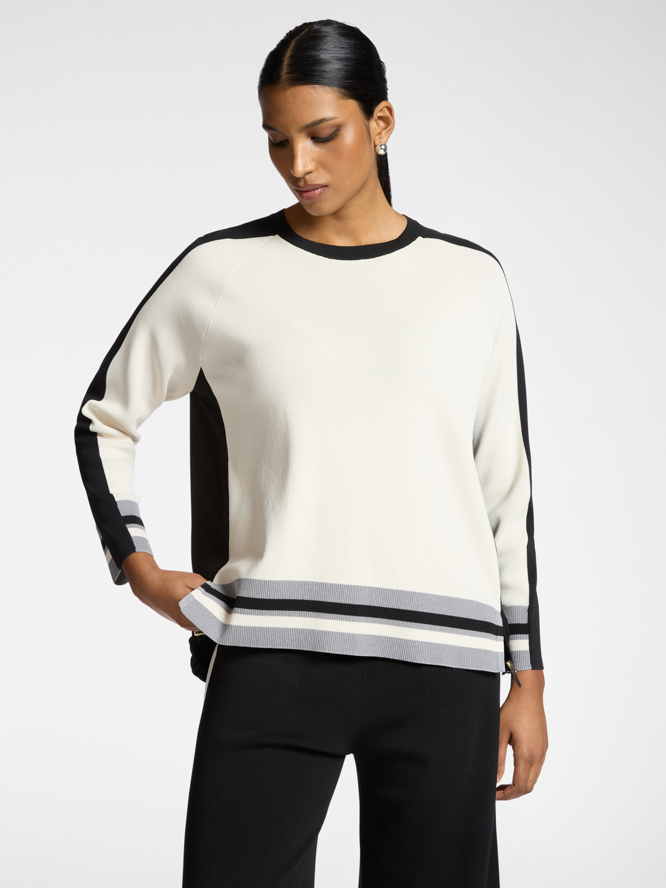 Sweater with striped edges