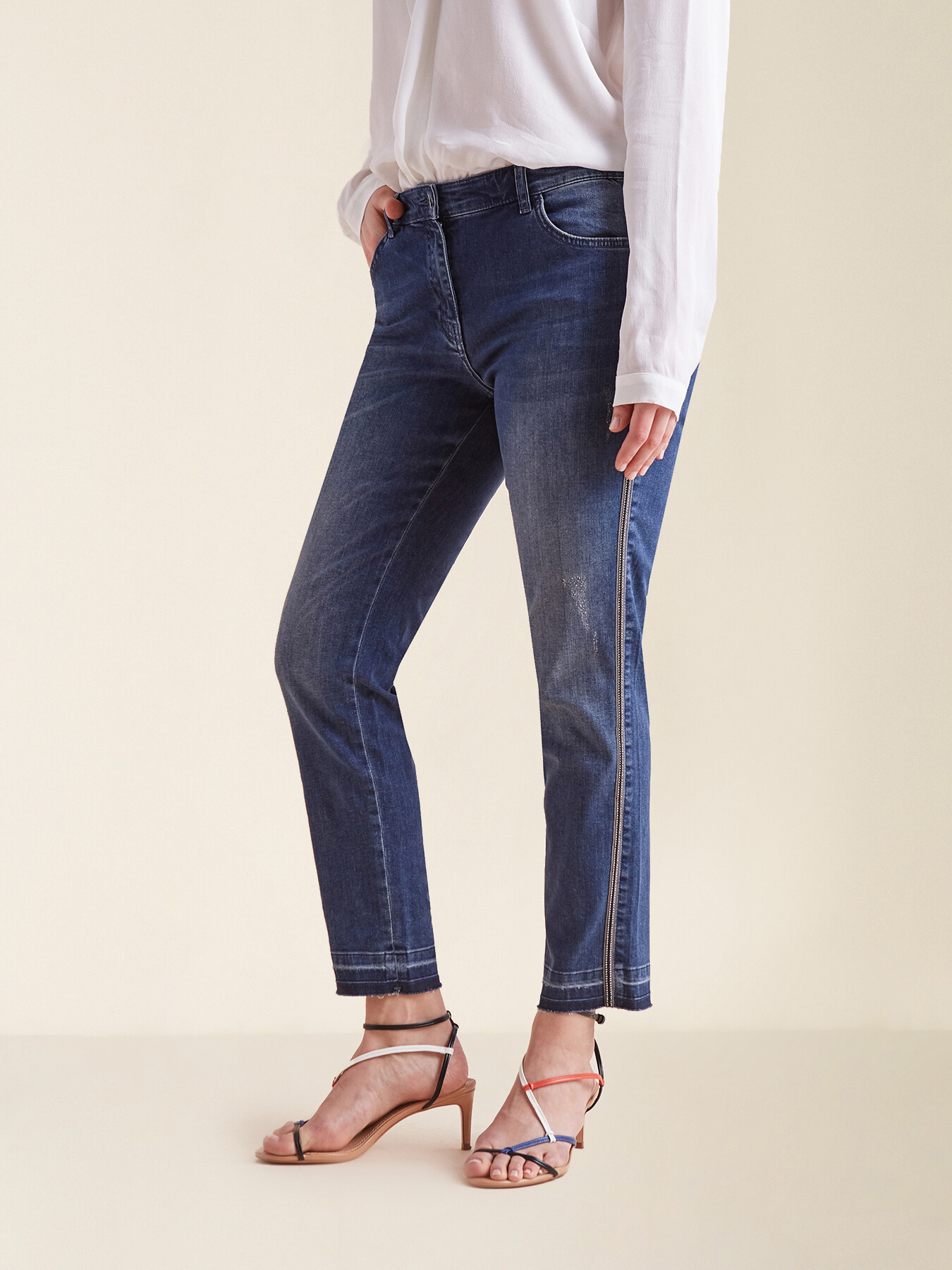 Skinny jeans with crystals on trim image number 2