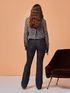 Jeans flared con nastro in vita image number 2