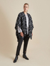 Chequered patterned cape image number 0