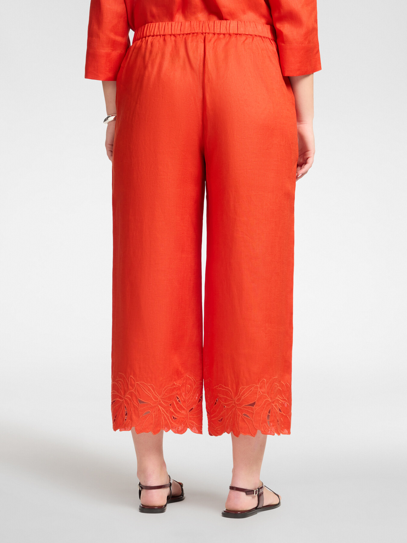Linen trousers with embroidered edges image number 1