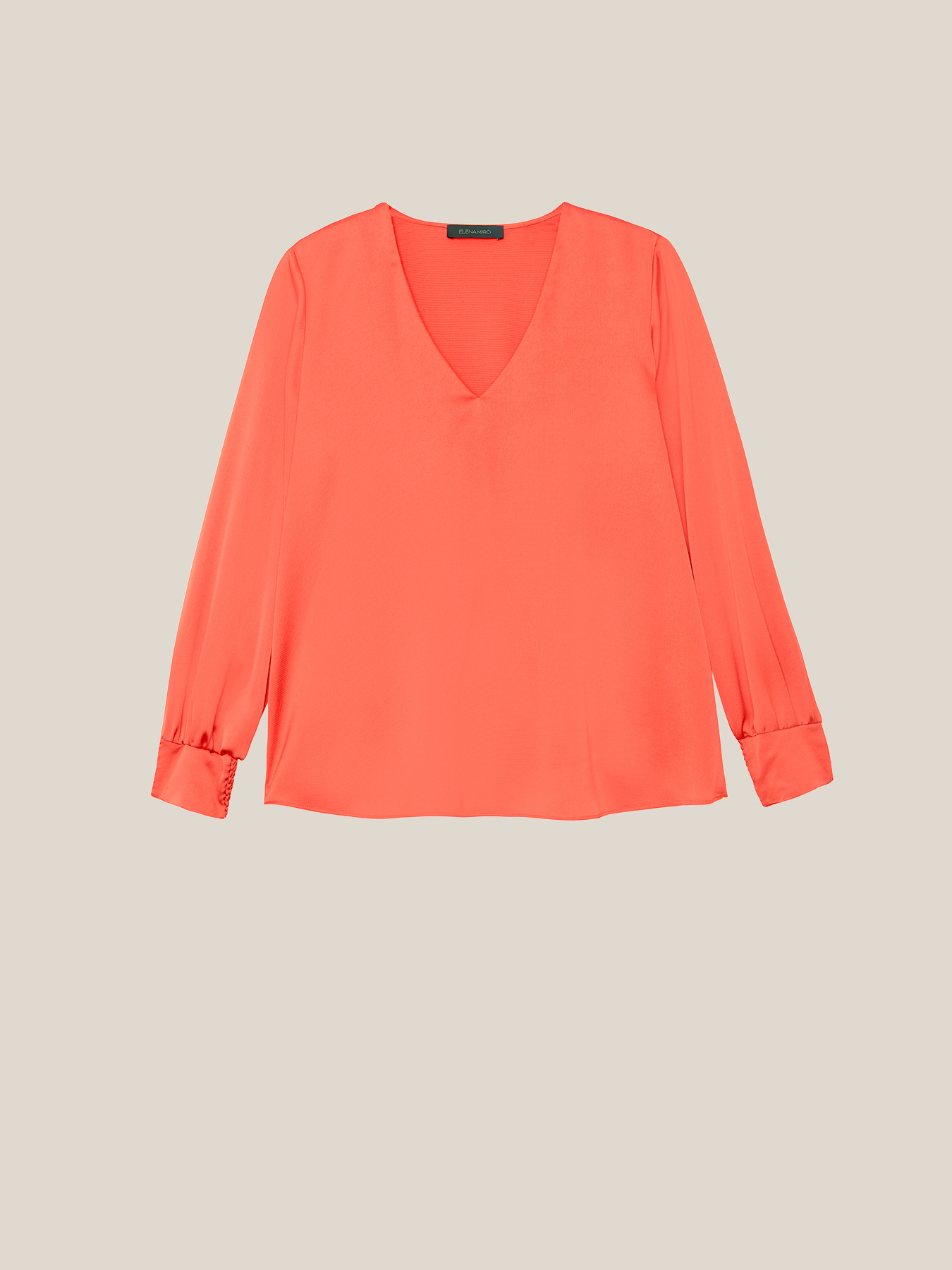 Blusa cuello pico de raso