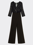 Elegant jumpsuit with embroidered sleeves and bodice image number 4