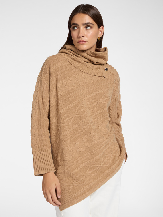 Asymmetrical cable knit wool sweater