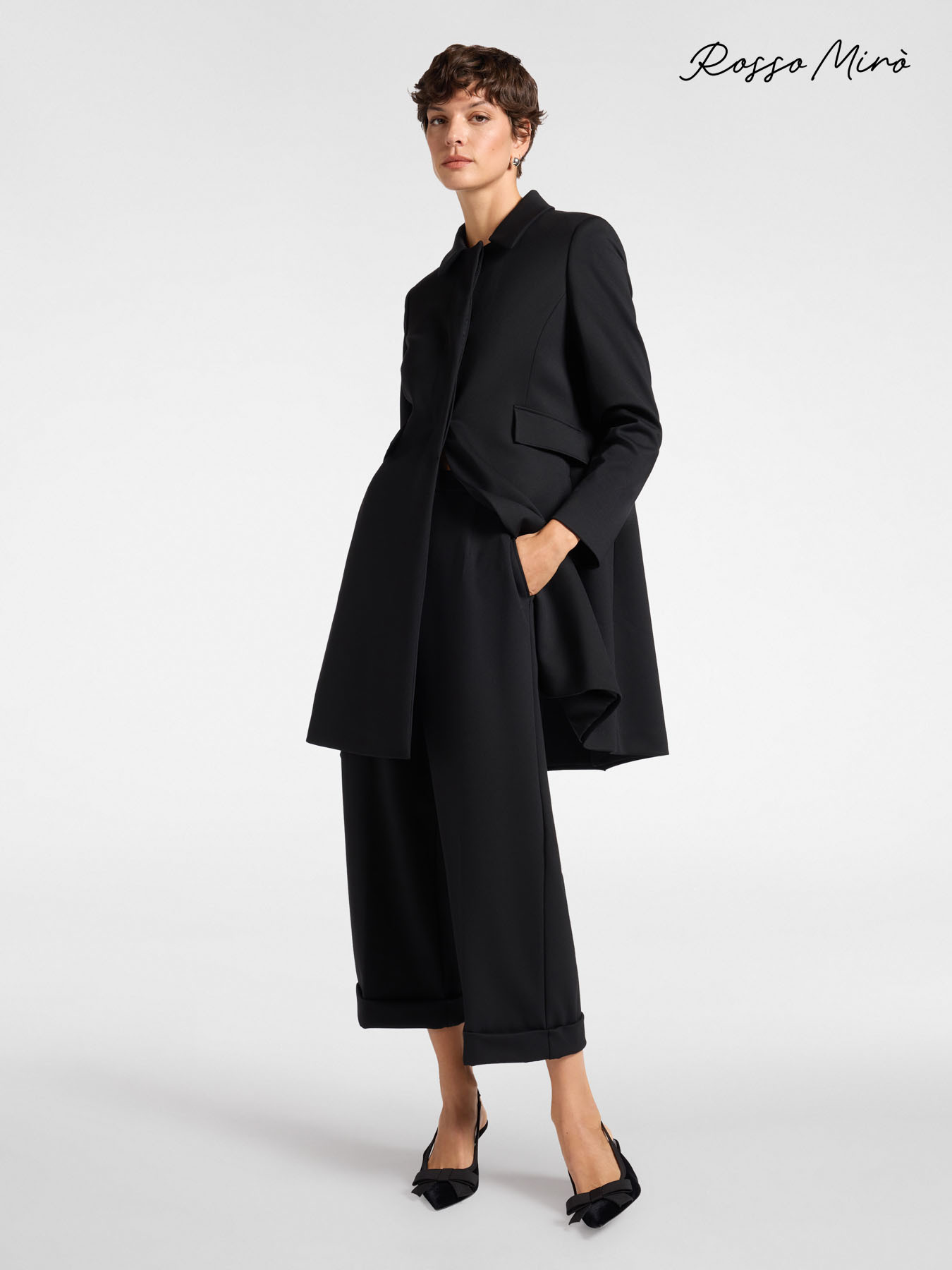 Cal&ccedil;as com punhos na parte inferior image number 0