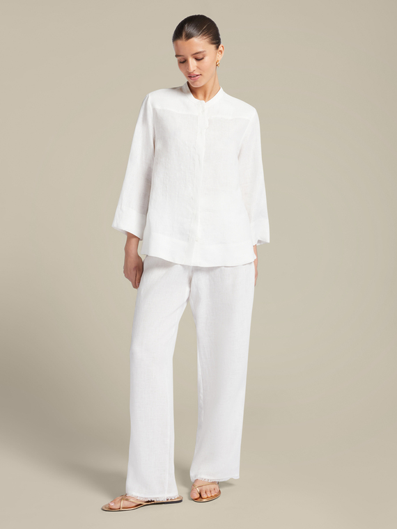 Linen trousers with fringes at the hem