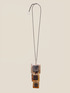 Lange Halskette mit Anhängern aus Kunstharz image number 1