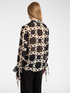 Blusa con monograma image number 1