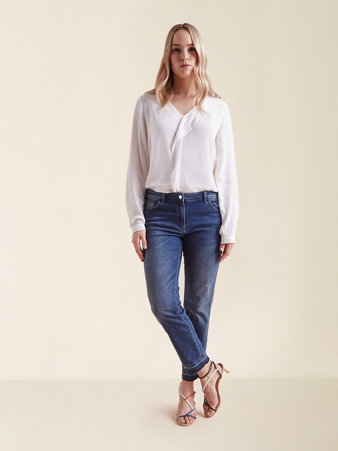 Skinny jeans with crystals on trim image number 0