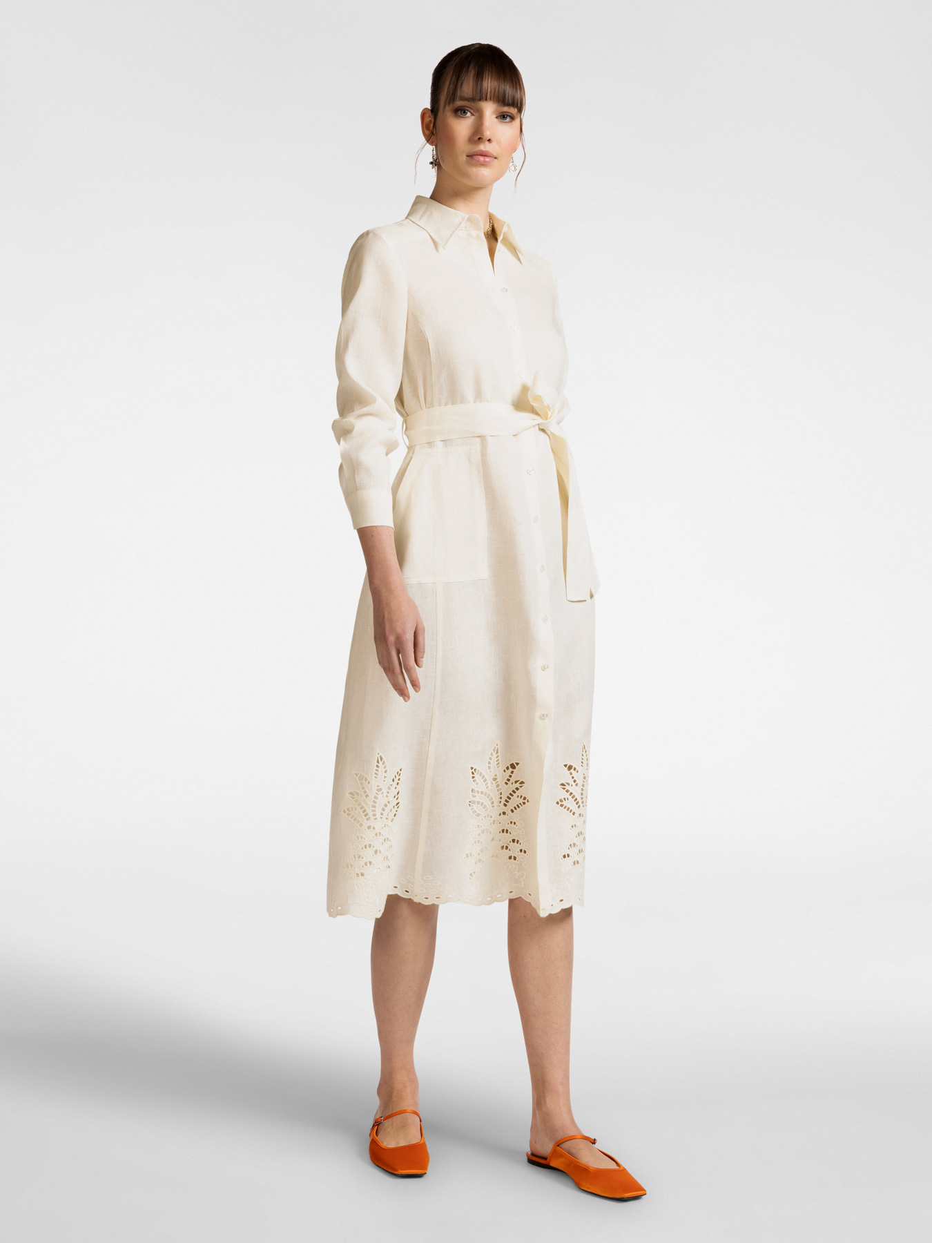 Linen dress with embroidered hem