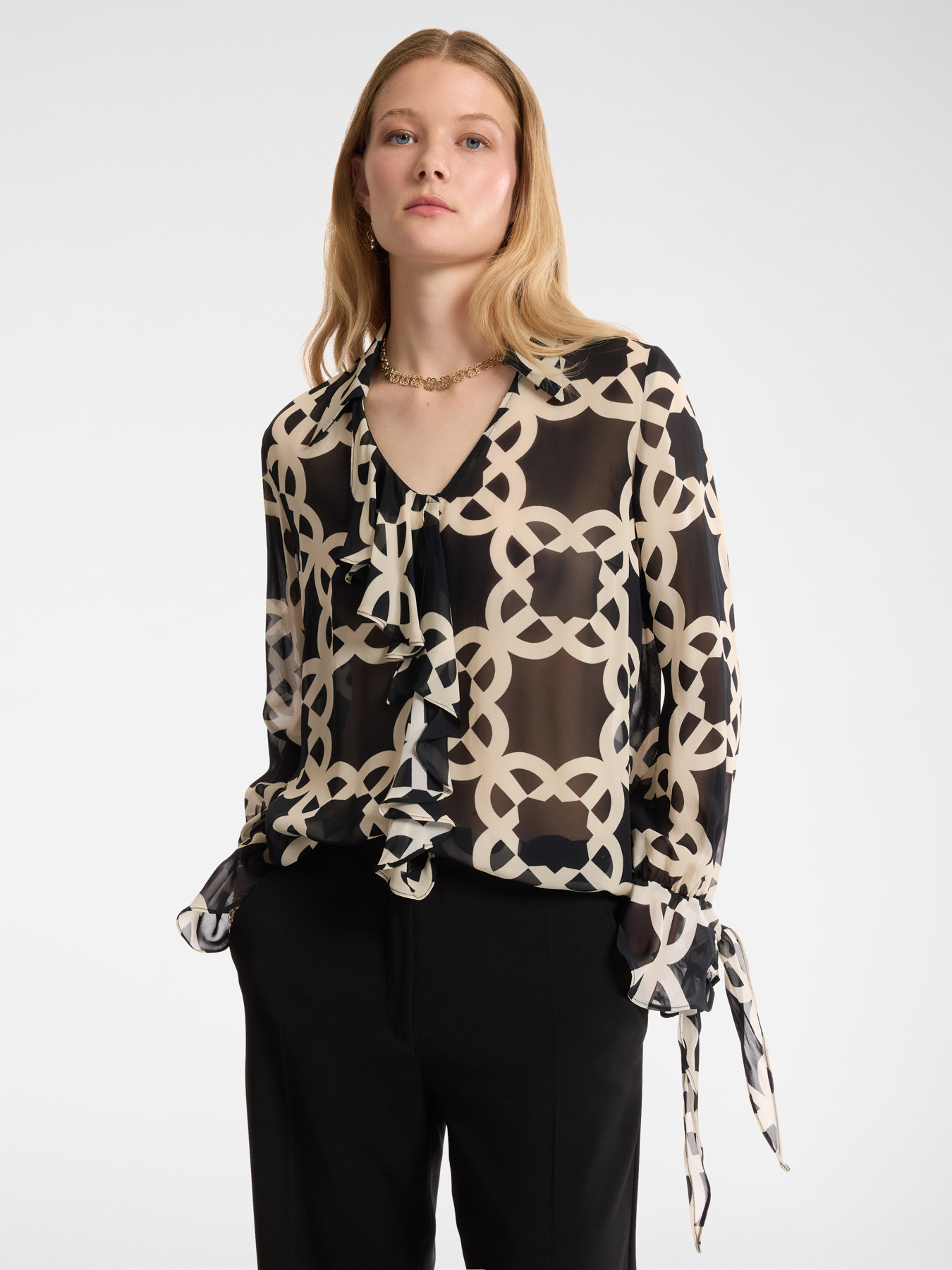 Blusa con monograma image number 0