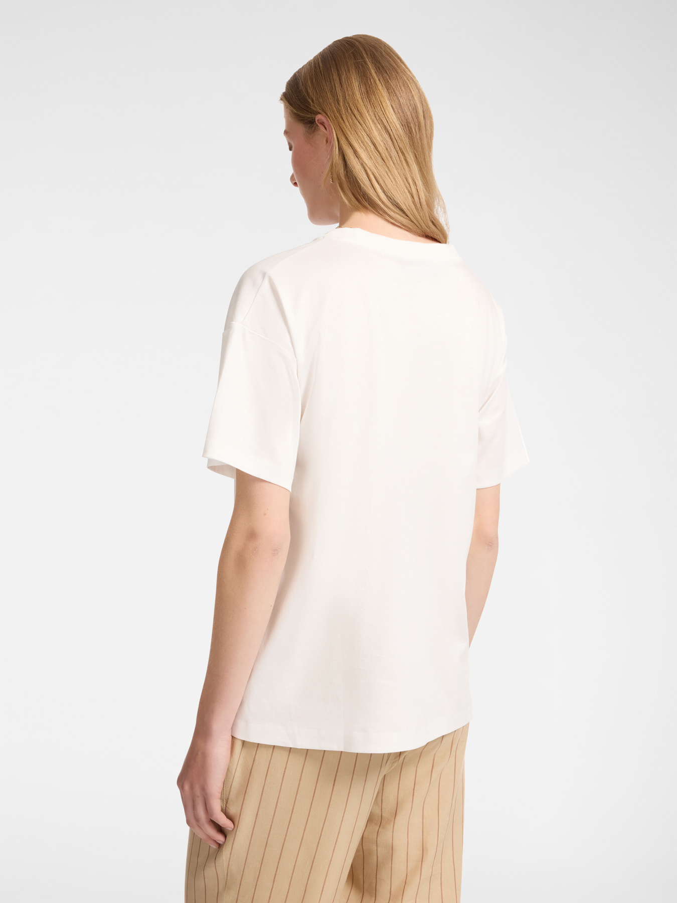 T-shirt con bottoni sugli spacchi image number 1