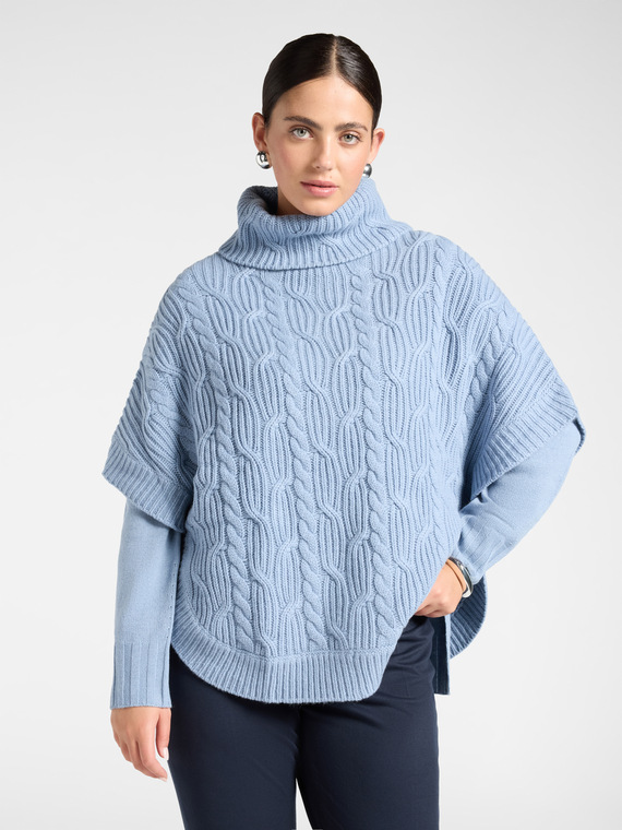 Cable knit poncho in pure wool