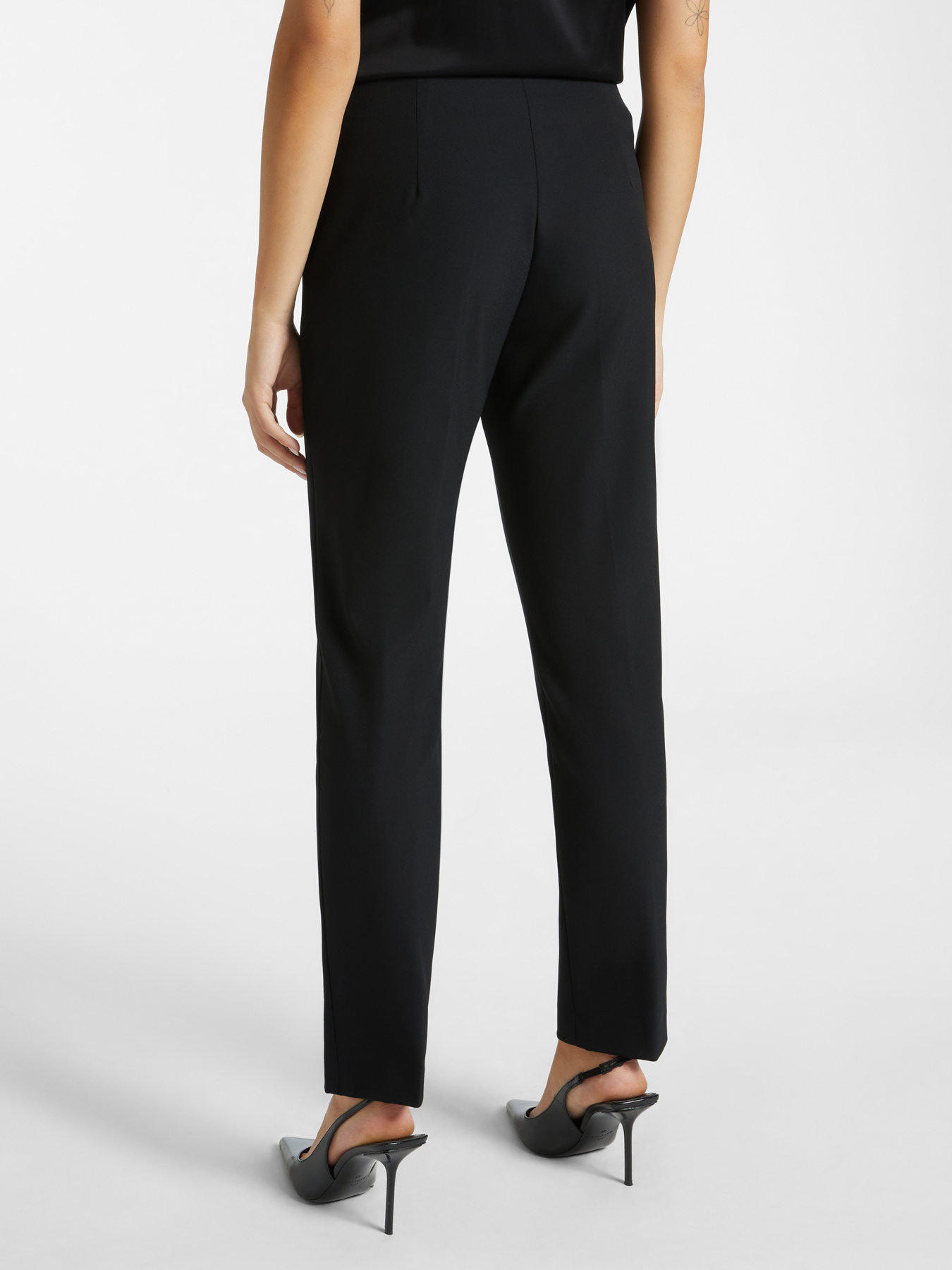 Slim fit trousers in technical fabric image number 1